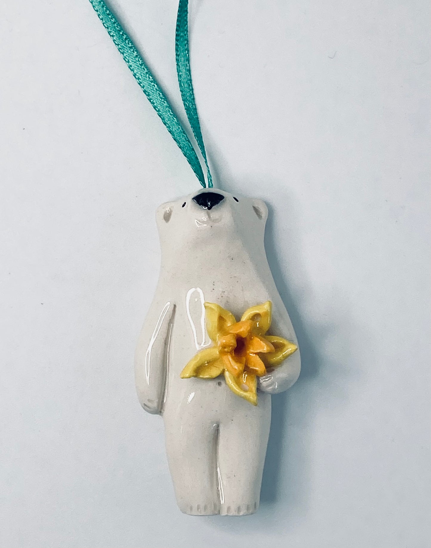 Polar Bear on ribbon with Daffodil