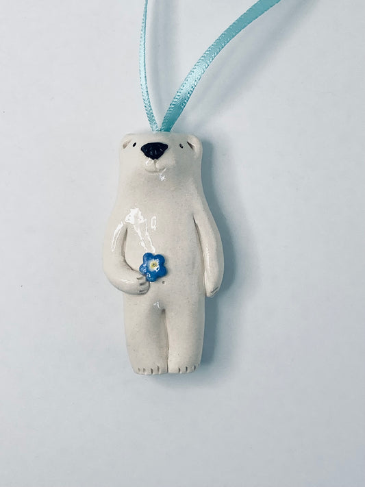 Polar Bear on ribbon with Forget Me Not
